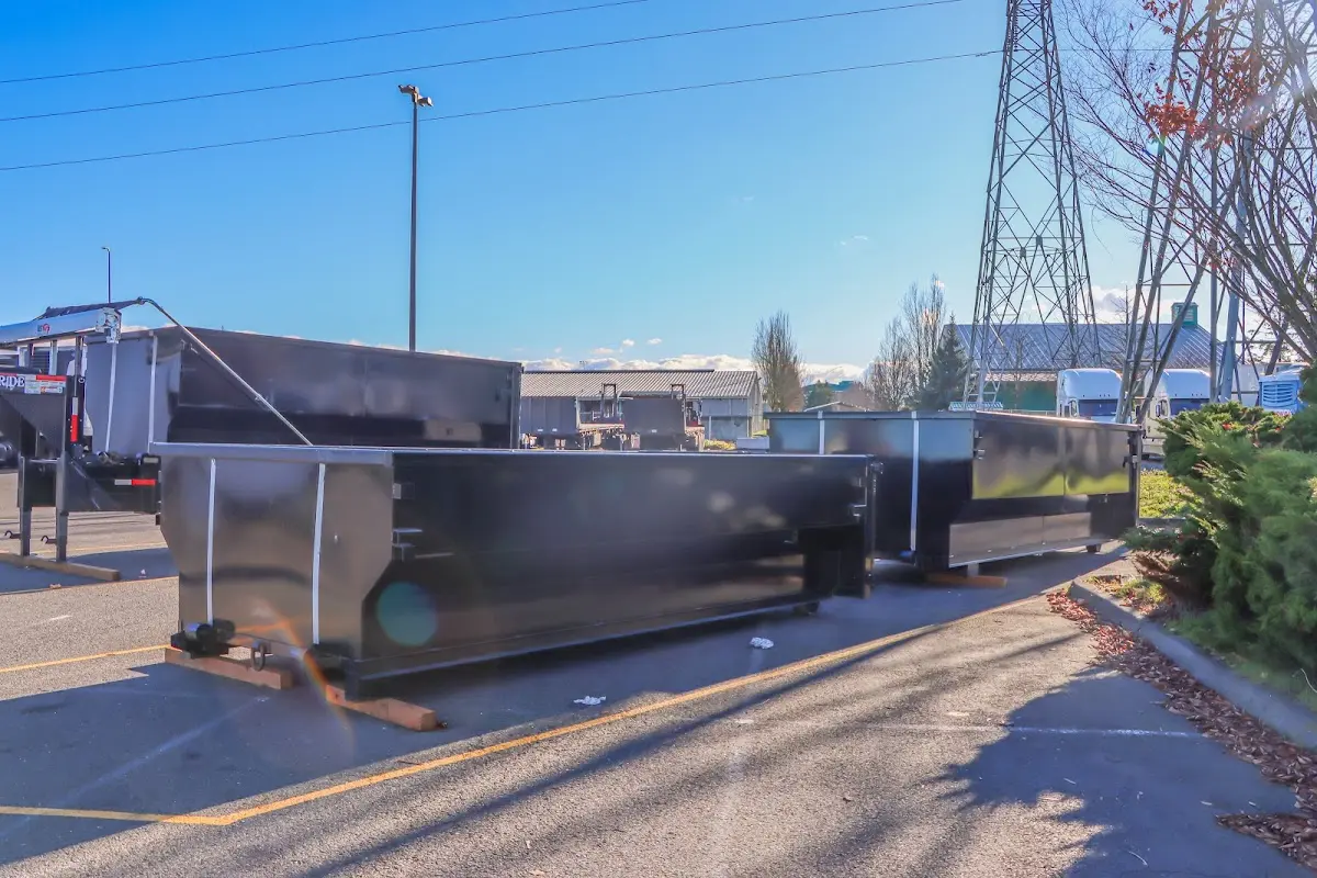 Roll-off dumpster ready for waste disposal at job site for 12 Yard Dumpster Rental in Burlington